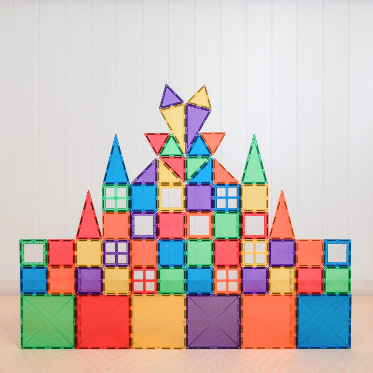 Connetix Rainbow Starter Pack - 60 Piece Set's colorful magnetic building blocks arranged to form a castle.