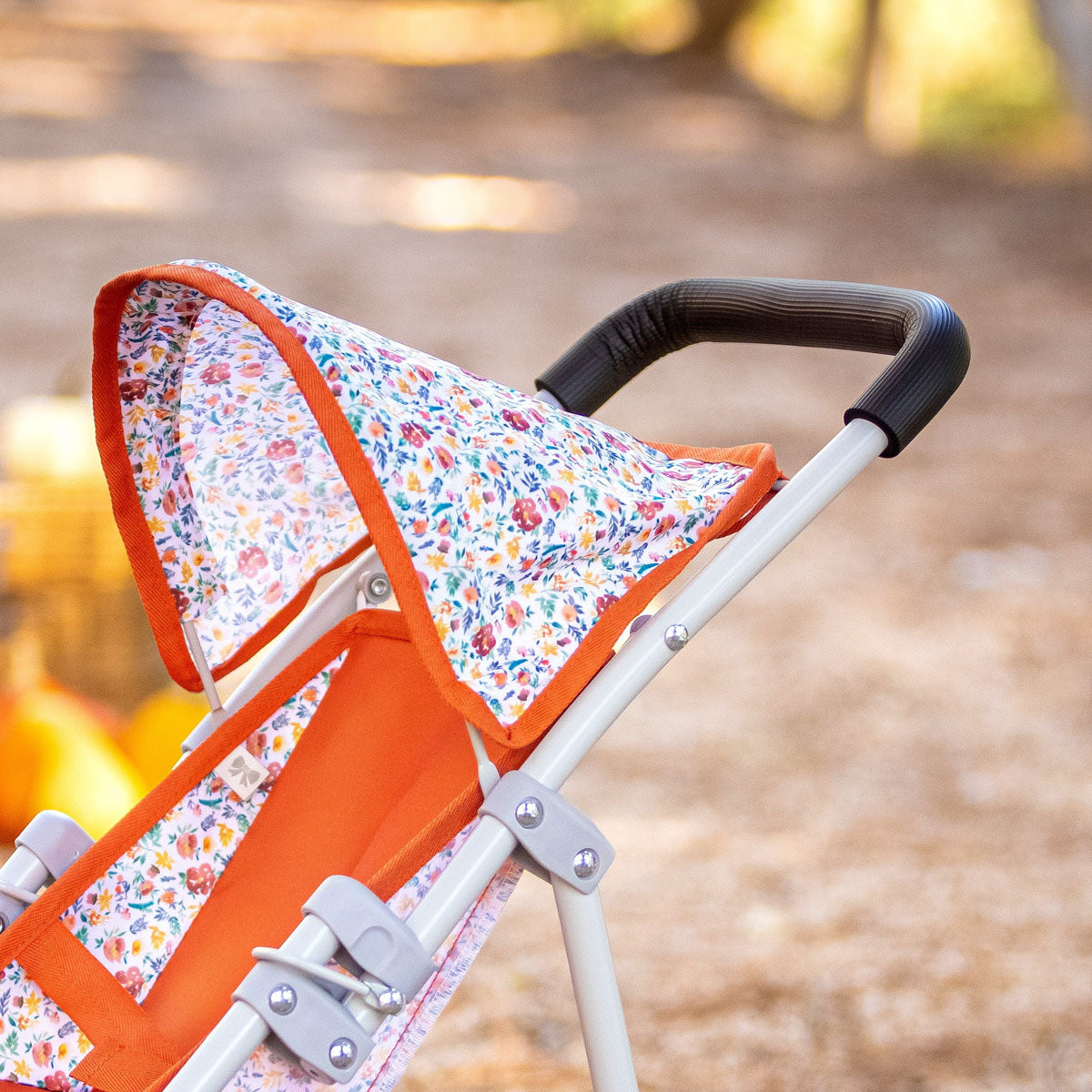 Berenguer Boutique Doll Jogger Stroller in Nature Red by JC Toys.