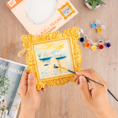 Person painting the Craft Hero Muddies Monet Sunrise 3D Wall Frame Painting Kit