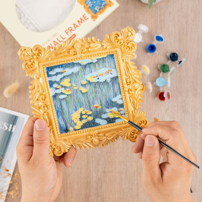 Person painting the Craft Hero Muddies Monet Water Lilies 3D Wall Frame Painting Kit