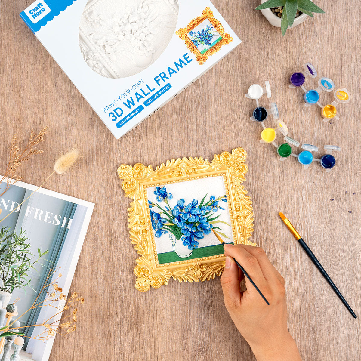 Person painting the Craft Hero Muddies Van Gogh Blue Irises 3D Wall Frame Painting Kit