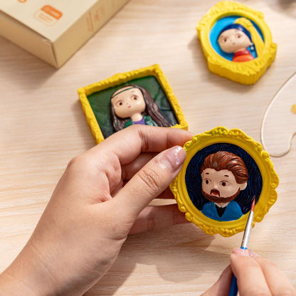 Hand painting one of the magnets in the Craft Hero Muddies Iconic Portraits 3D Magnets Painting Kit
