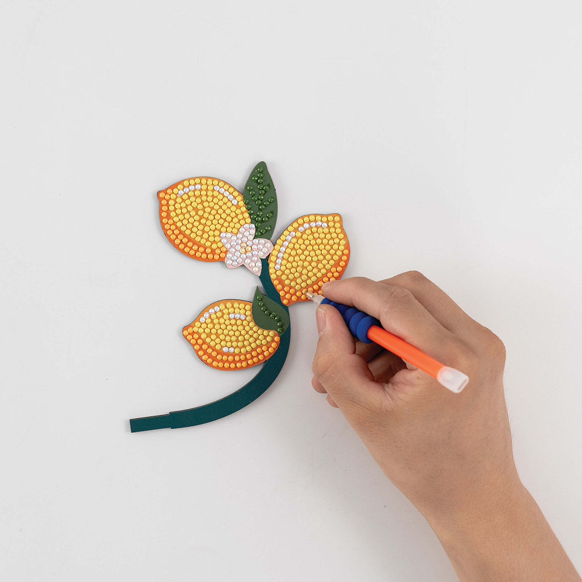 Person working on the Craft Hero PixelPop Limoncello 3D Diamond Painting Kit 
