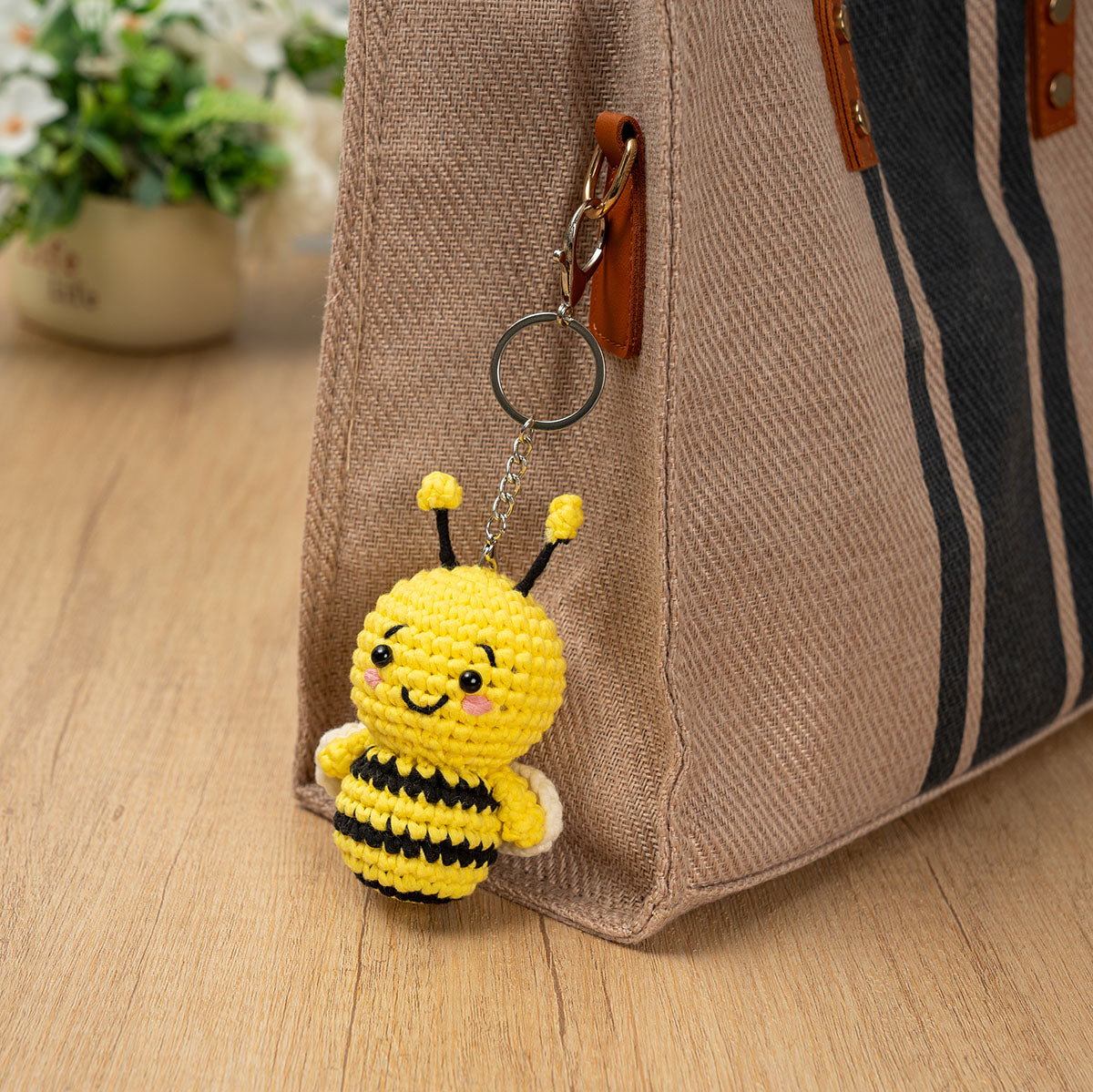 Craft Hero Threadies Beatrice Bee Crochet Kit completed project as a bag clip