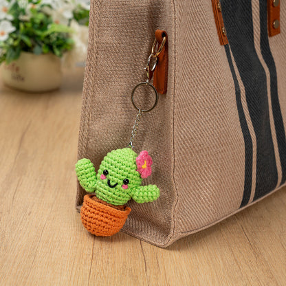 Craft Hero Threadies Carla Cactus Crochet Kit completed project as a bag clip.