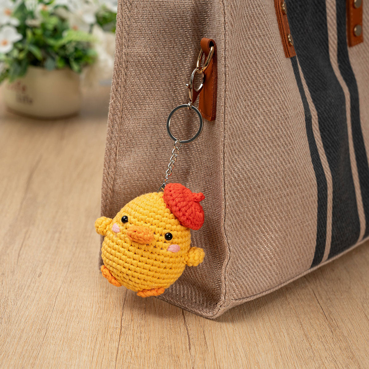 Craft Hero Threadies Colette Duck Crochet Kit completed project as a bag clip.