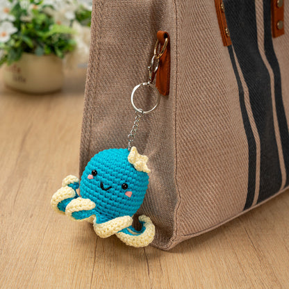 Craft Hero Threadies Ollie Octopus Crochet Kit completed project shown as a bag clip