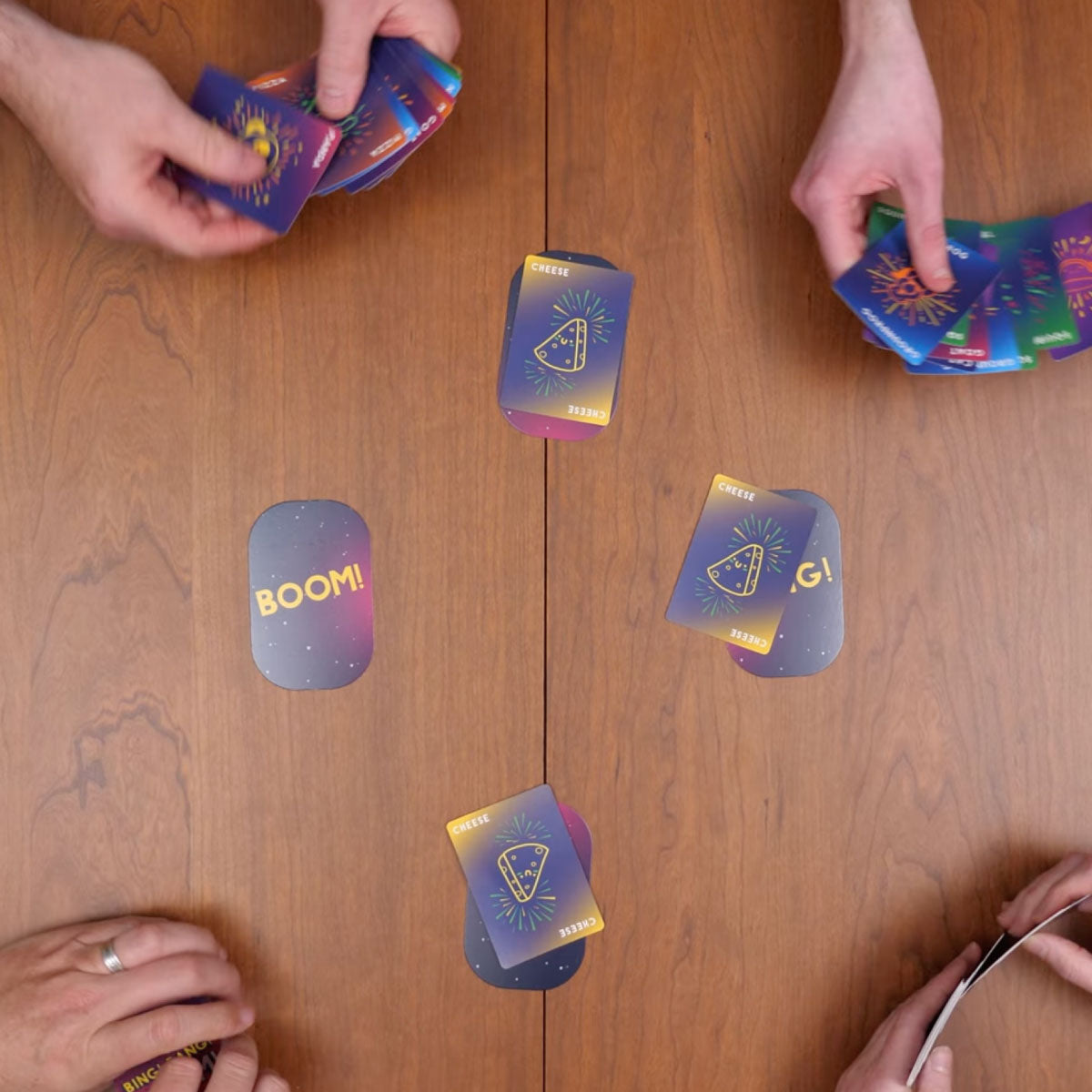 People playing Dolphin Hat Games' Bing! Bang! Boom! Card Game 