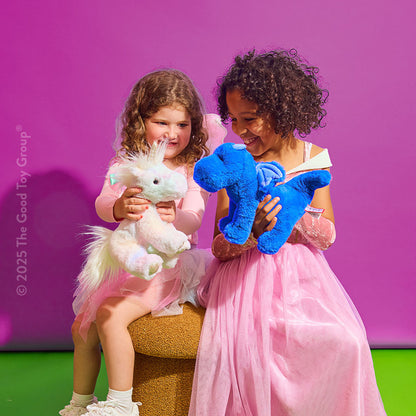 Two children playing with Douglas Cuddle Toys' Indie Blue Dragon and Kylie Unicorn