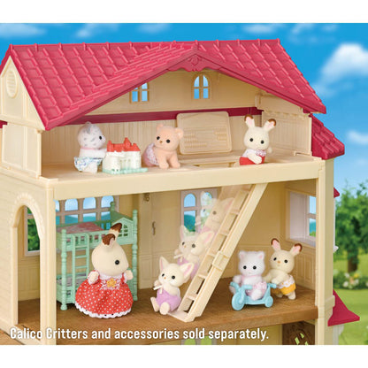 Red Roof Country Home Gift Set with Secret Attic Playroom set up with additional Calico Critters and accessories, sold separately.