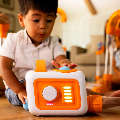 Fat Brain Toy Co Air Toobz EVO - Child pushing ball into air compressor device
