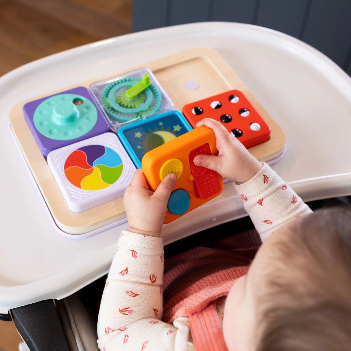 Baby playing with the PlayTab Modular Sensory Board from Fat Brain  Toy Co