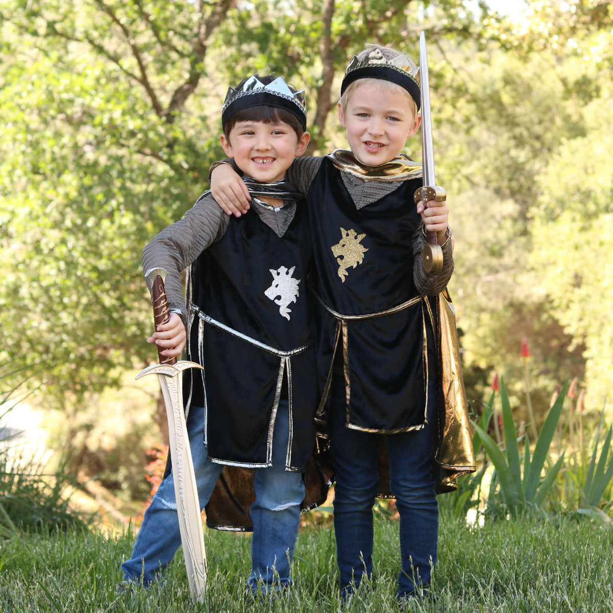 Kids wearing the Great Pretenders Silver Knight and Gold Knight sets.