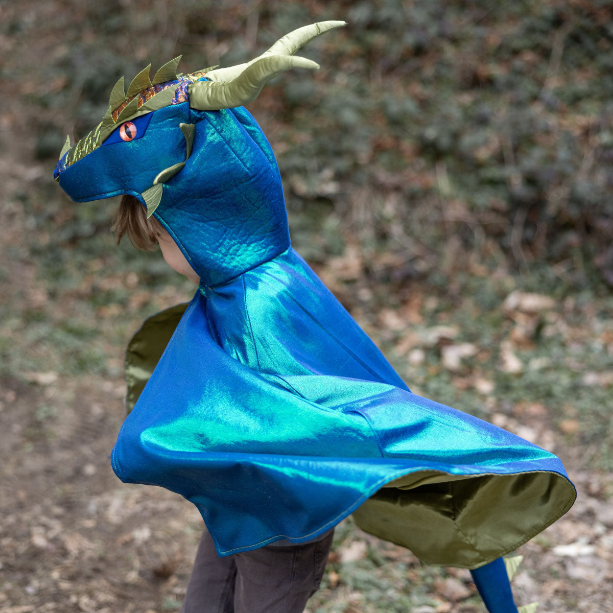 Child wearing the Great Pretenders Emerald Metallic Dragon Cape