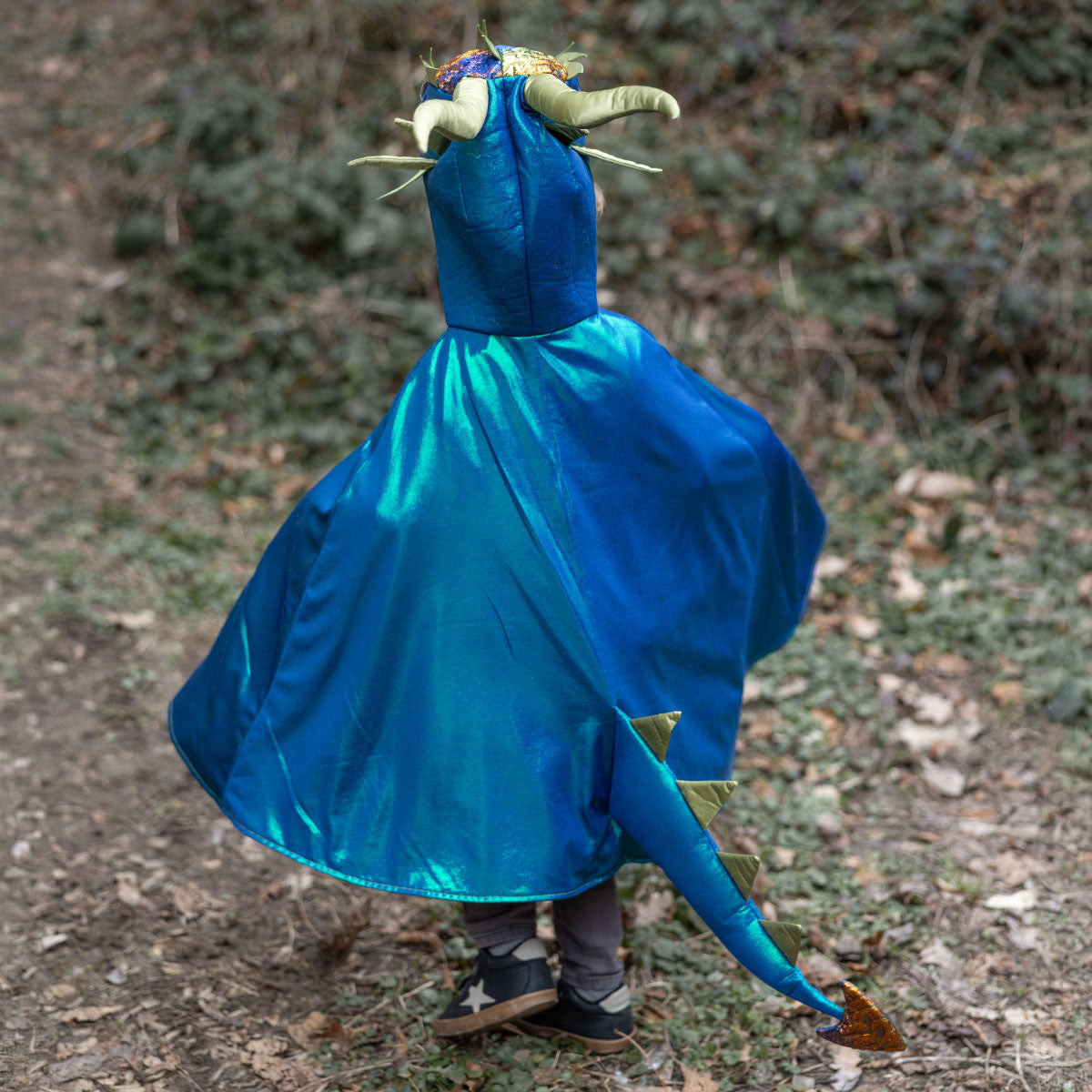 Child wearing the Great Pretenders Emerald Metallic Dragon Cape