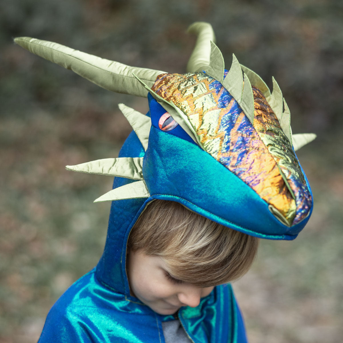 Child wearing the Great Pretenders Emerald Metallic Dragon Cape