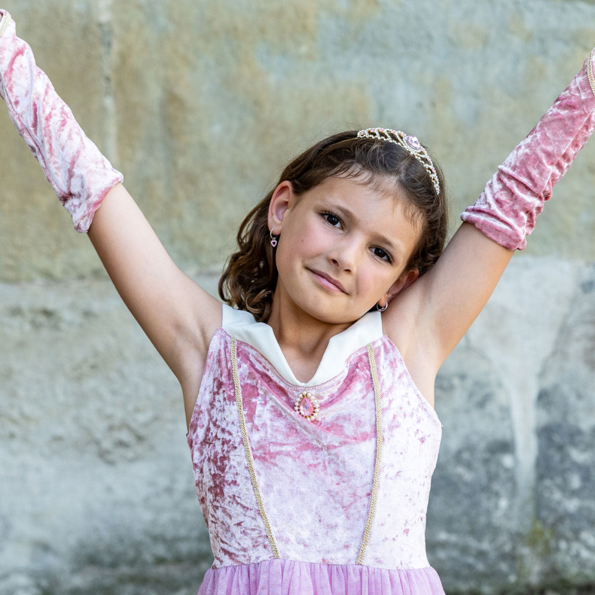 Young girl wearing Great Pretenders Velvety Soft Sleeping Sweetheart Princess Gown with Arm Warmers