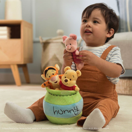 Gund Disney Winnie the Pooh Plush Playset with Pooh Bear, Piglet, and Tigger.