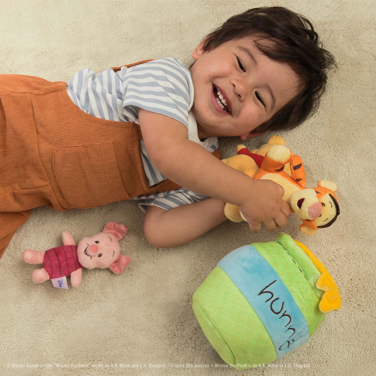 Gund Disney Winnie the Pooh Plush Playset with Pooh Bear, Piglet, and Tigger.