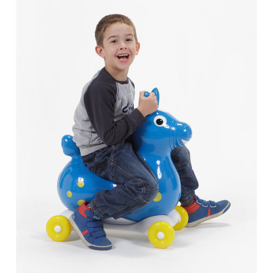 Child riding a Rody Horse with the Gymnic Rody Speedy Rolling Base 