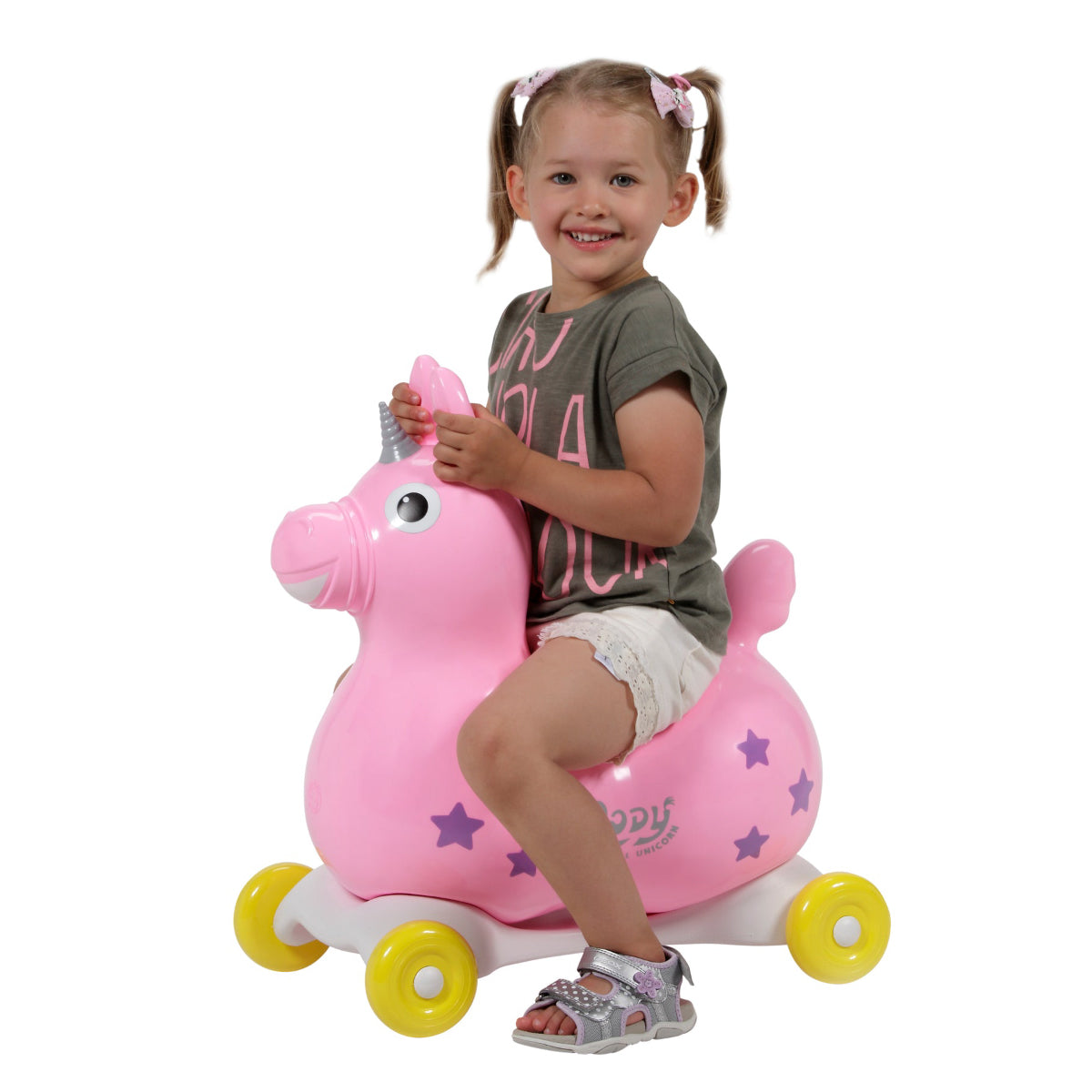 Child riding a Rody Unicorn with the Gymnic Rody Speedy Rolling Base 