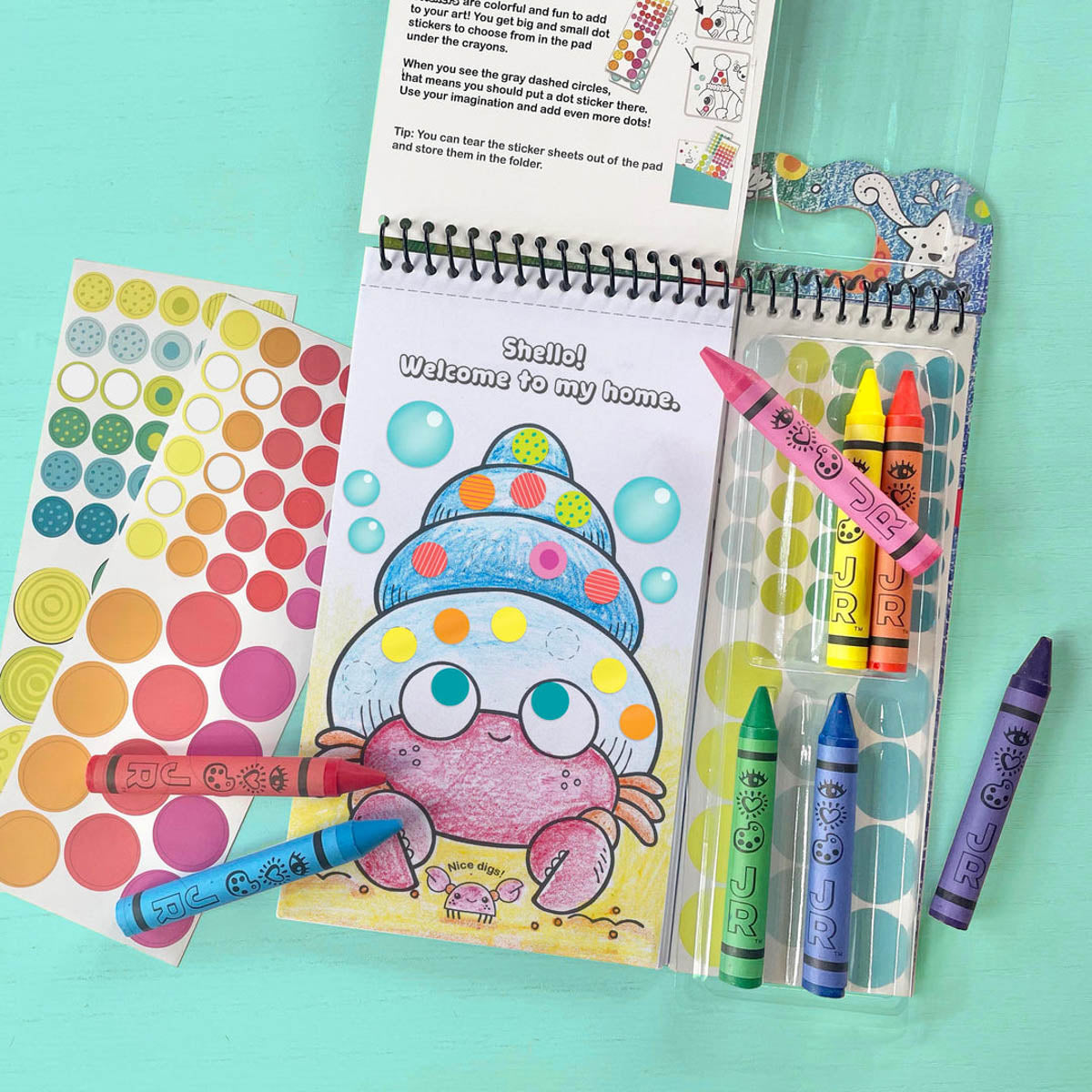 iHeartArt JR Art on the Go, Dotty Ocean, from Bright Stripes. Color and stick activity pad includes 50 pages with 24 activities, 294 dot stickers, and 8 crayons.