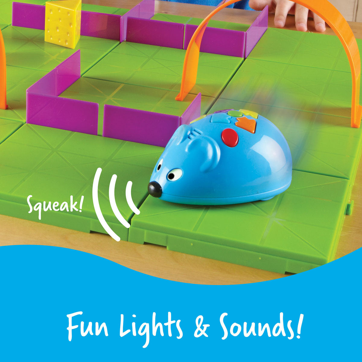 Learning Resources Code & Go Robot Mouse STEM activity set mouse with lights and sounds on a green track with colorful barriers