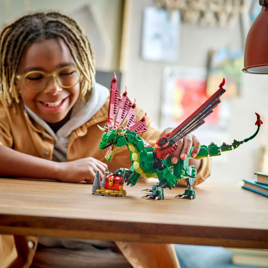 Child playing with LEGO Creator 3 in 1 Medieval Dragon