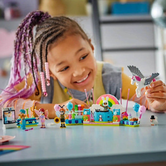 Child playing with LEGO Friends Costume Party with Unicorn & Fairy