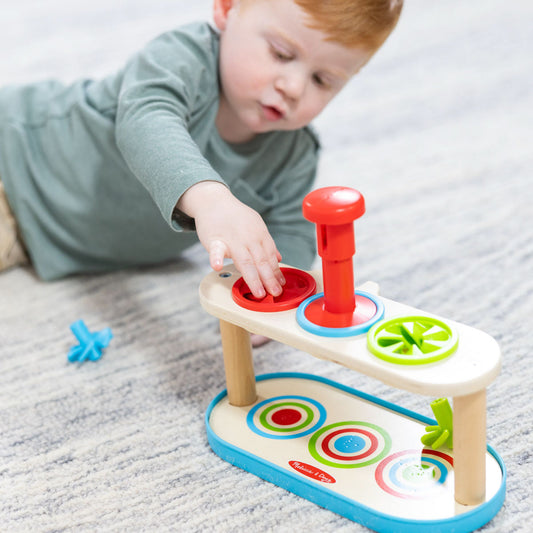 Match & Push Spinning Tops toy by Melissa and Doug.