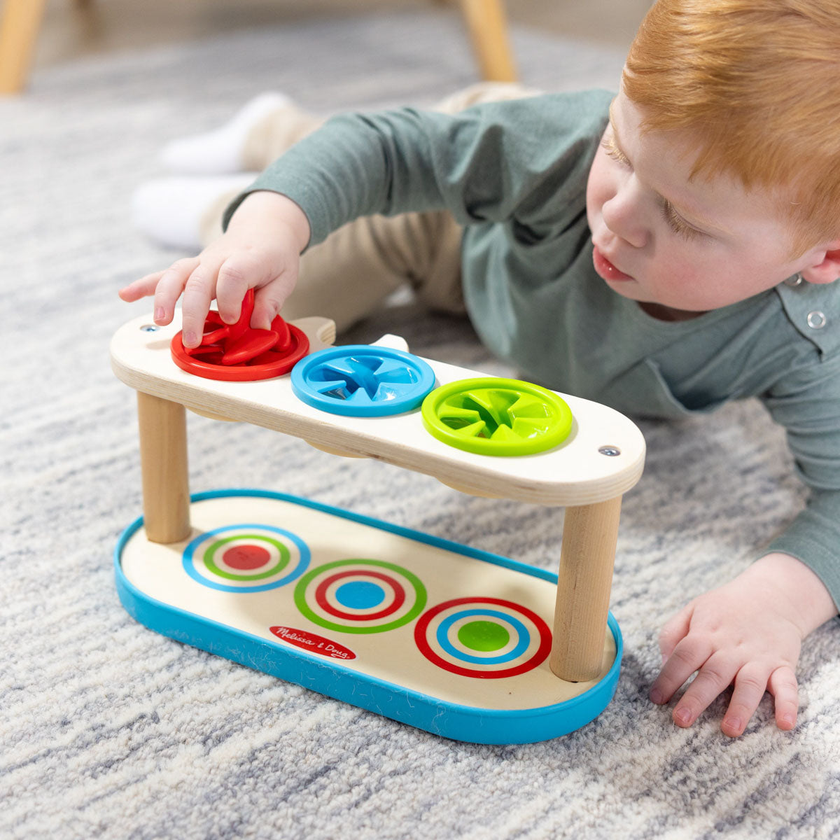 Match & Push Spinning Tops toy by Melissa and Doug.