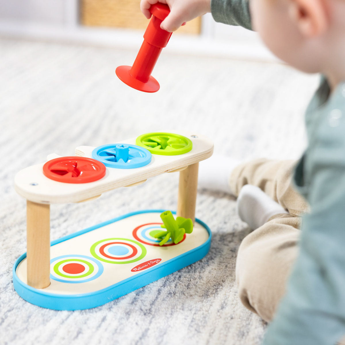 Match & Push Spinning Tops toy by Melissa and Doug.