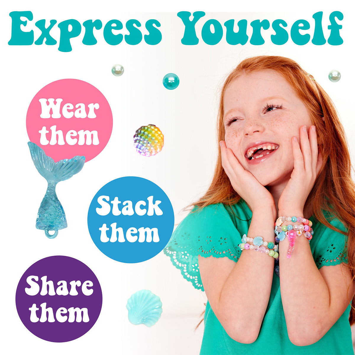 Express yourself. Wear them. Stack them. Share them. Smiling girl wearing Unicorn Bead Jewelry by Creativity for Kids.