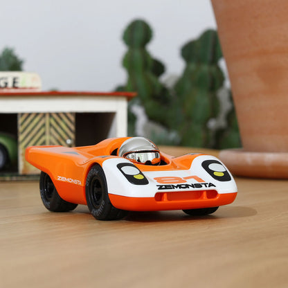 Playforever Zemonsta Race Car Egon parked on a table