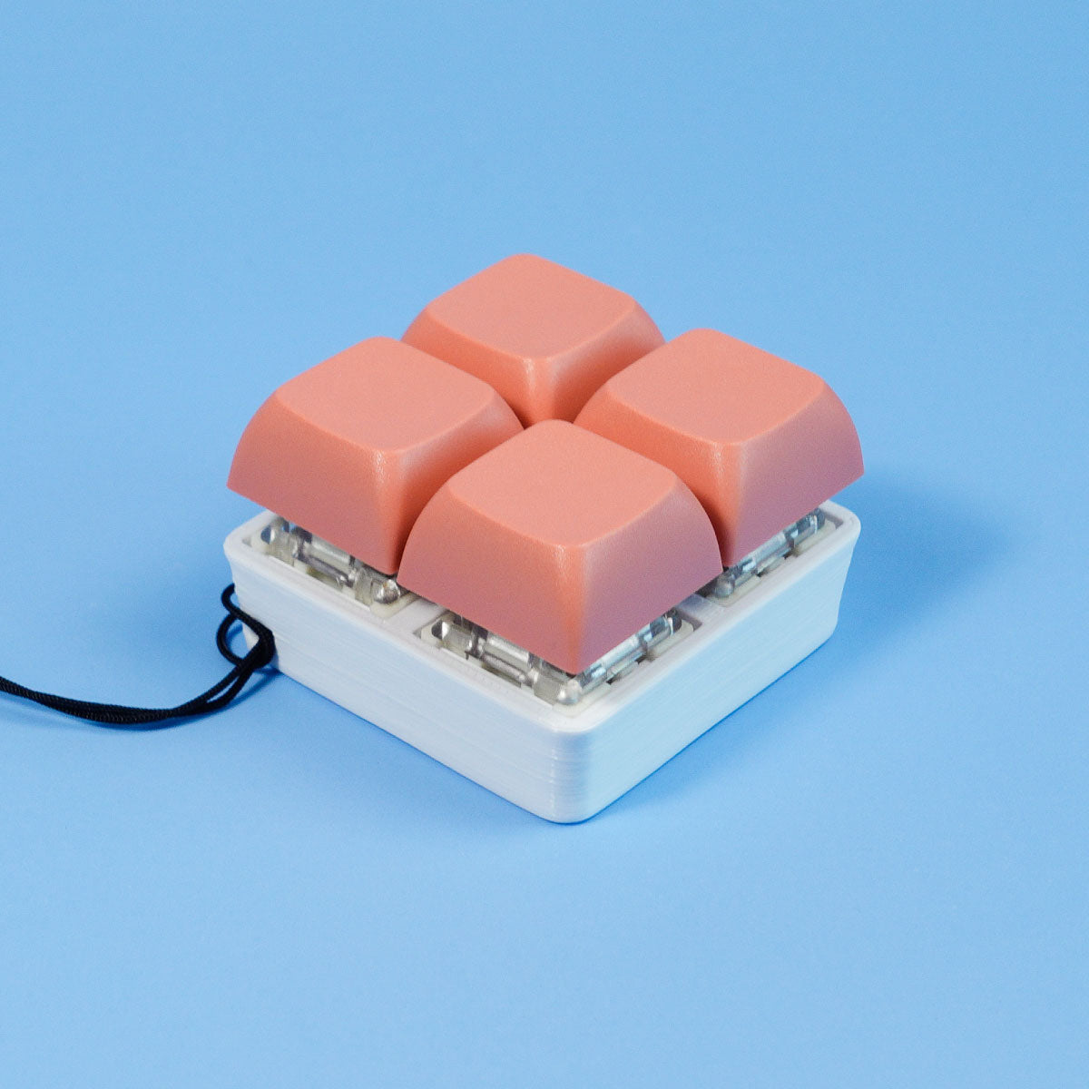 Strudel3D Light Red 4 Key Keyboard Fidget Square