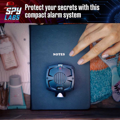 Product placed on a journal. Protect your secrets. Thames and Kosmos Spy Labs Motion Detector Alarm