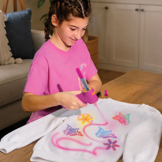 Air Color Airbrush Kit - Permanent Fashion Colors - example image of child using the airbrush.
