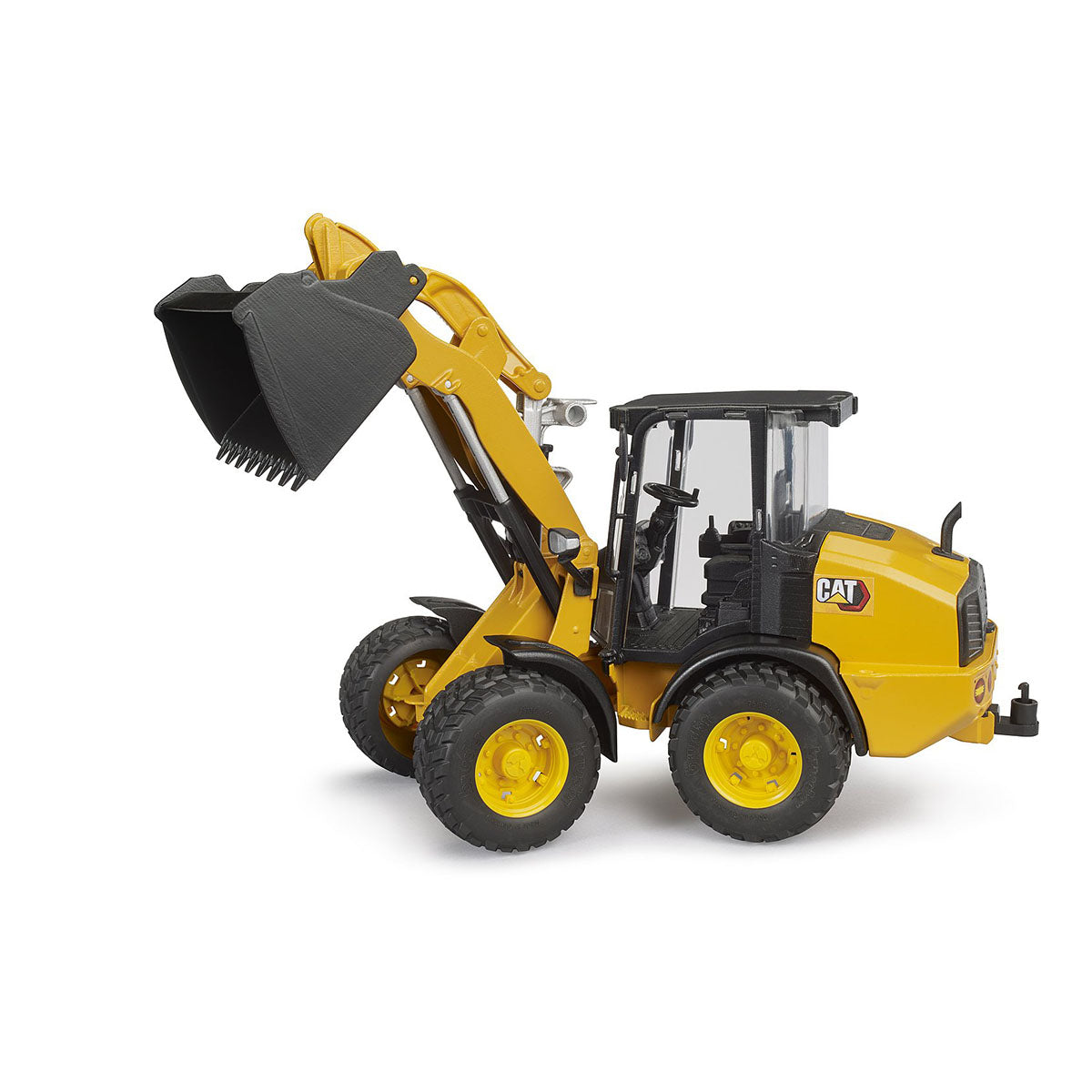 Wheel loader construction CAT brand toy with loading arm raised by Bruder.