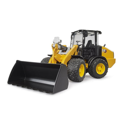 Wheel loader construction CAT brand toy shovel view by Bruder.